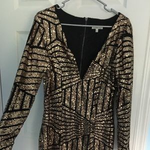 Dress with black and gold sequins